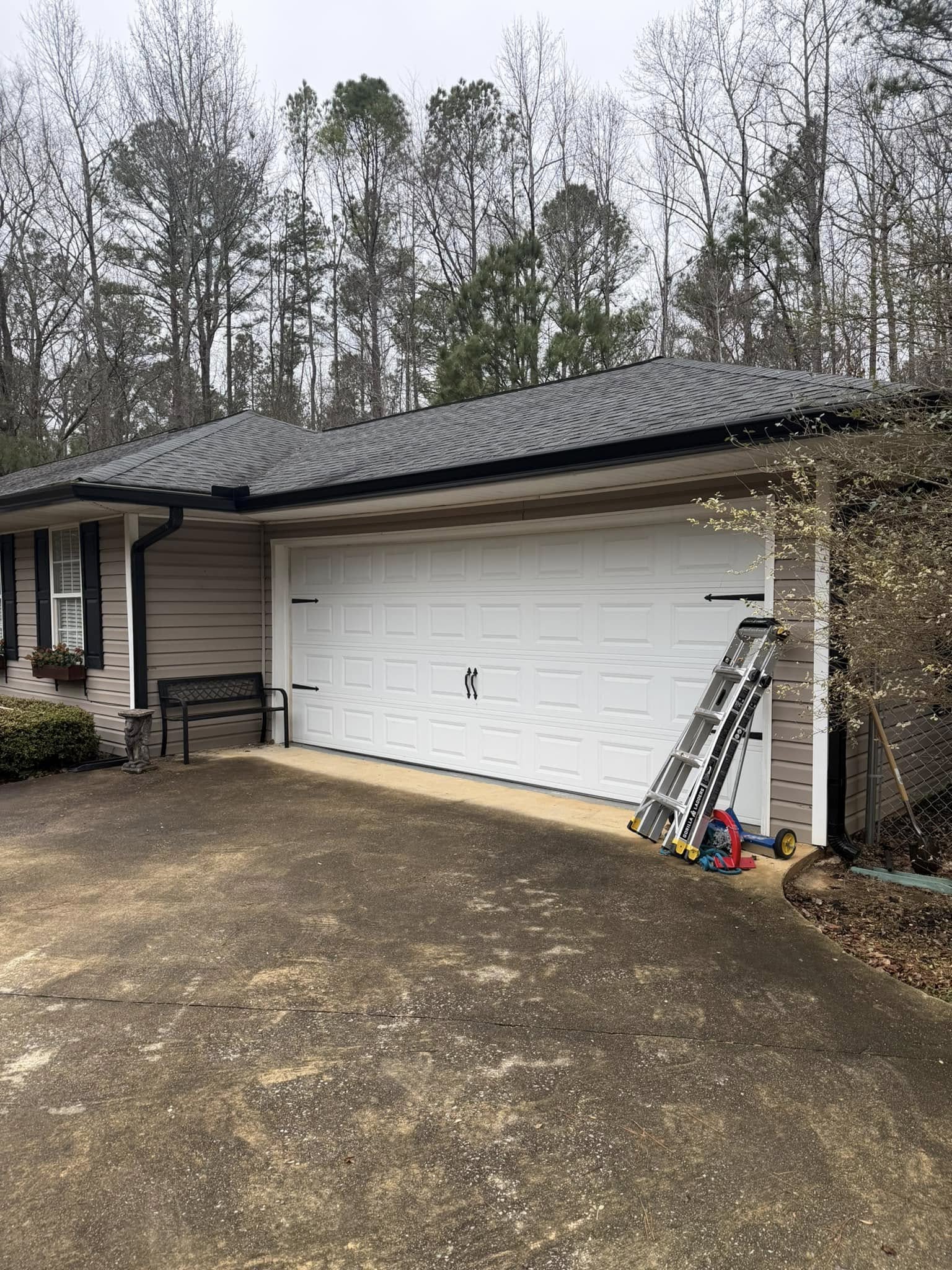 Gutters Fresh black gutters and downspou